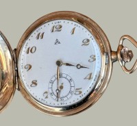 Auktion 367<br>vergoldete Sprungdeckel Taschenuhr "Alpina" Swiss, Werk steht, vorne Ziermonogramm "KT", guter Zustand, D-5 cm