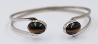 Auktion 368<br>Armspange, 835er Silber mit Tigerauge, 17gr.