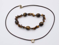 Auktion 368<br>Armband Tigerauge sowie kl. Silberanh&auml;nger an Kautschukband, Kette ca. L-40cm