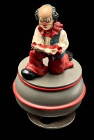 Auktion 368 / Los 15051 <br>Spieluhr mit "Gilde" Clown und Liebesbrief,k Werk l&auml;uft, H-13 cm