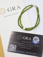 Auktion 368<br>2reihiges Peridot-Armband mit einem 1ct Moissanite , L-19cm, anbei GRA-Zrtifikat