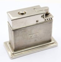 Auktion 368 / Los 11027 <br>gr. Tischfeuerzeug, 835er Silber, Ziermonogramm, ca. 7 x 9cm, kompl. ca. 218,2gr.