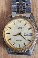 Auktion 368<br>mechan. HAU "Q&amp;Q" automatic, Werk l&auml;uft, Stahlband