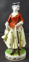 Auktion 369 / Los 8017 <br>Dame mit Flinte "Royal" bemalt, H-17 cm