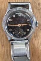 Auktion 369 / Los 2034 <br>kl. mechan. Armbanduhr "Junghans" 50-er Jahre, Werk l&auml;uft, Metall Zugband, Kaliber 88