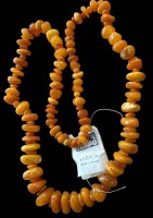 Auktion 369<br>lange gelbe Bernstein-Halskette, polnisches Etikett, L-ca. 78 cm, 86 gr