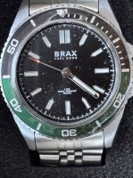 Auktion 369<br>Quartz HAU "Brax" Feel good, neuwertig in orig. Blechdose