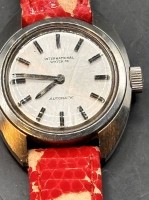 Auktion 369<br>mechan. DAU "IWC" Automatic, Werk l&auml;uft, Uhr gut erhalten, Lederband l&ouml;st sich auf