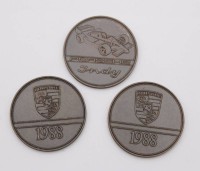 Auktion 374<br>3x Porsche Indy - Medaillen aus dem Jahr 1988, Bronze, ca. D-3,8cm