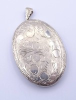 Auktion 370<br>Gro&szlig;es Fotomedaillon, Silber (gepr.), L. 5,4cm (ohne &Ouml;se gemessen), 24g.