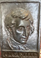 Auktion 370 / Los 15028 <br>F.H.L. Hartmann, 1907, gr. . Relief-Portrai t"C.M. von Weber"" Keramik/Stuck, kl. Farbabplatzer, 54x37 cm