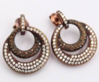 Auktion 370<br>Paar 925er Silber-Ohrstecker, klare Steine, zus. ca. 5,1gr., L-2,5cm