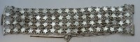 Auktion 370<br>breites versilbertes Armband, wohl Indien, L-18 cm, B-4 cm