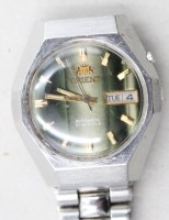 Auktion 370<br>Vintage Herren-Armbanduhr, Orient, Automatik, Werk l&auml;uft, Tragespuren, ca. D-3,6cm