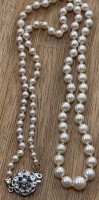 Auktion 371 / Los 1014 <br>Perlenkette, verlaufend, Goldschliesse-585- mit Safire und Perle, gr&ouml;sste Perle 0,5 cm