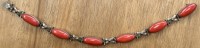 Auktion 371 / Los 1015 <br>Silber-800- Armband mit Korallen-Cabouchons, L-19 cm, ca. 14 gr.