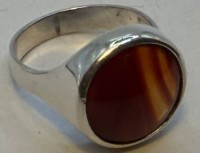 Auktion 371 / Los 1019 <br>Silberring-925- mit braun marmorierten Stein, RG 61, 6,4 gr.