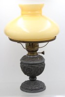 Auktion 371 / Los 16011 <br>Petroleum-Lampe, 19. Jhd., reliefierter Stand, ca. H-43,5cm