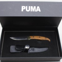 Auktion 371<br>PUMA TEC G&uuml;rtelmesser mit Griffschalen aus Olivenholz, Lederscheide und orig. Karton, Gebrauchsspuren, ca. L-19,5cm