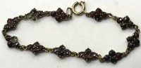 Auktion 371<br>antikes Doublee-Armband mit facettierte Granate, 3 St&uuml;ck fehlen, L-ca. 18 cm
