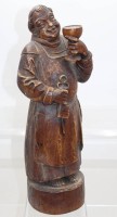Auktion 371 / Los 15097 <br>Holz-Figur, trinkender M&ouml;nch, Gebrauchsspuren, ca. H-45,5cm