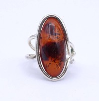 Auktion 371<br>Bernstein Silber Ring 0.925, 6,7g., RG 56, eine Seite lose