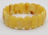 Auktion 371<br>Bernstein-Zugarmband, Butterscotch, ca. B-2,2cm, 16,8gr.