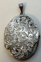 Auktion 371<br>Silber-835-  Medaillon, H-4 cm (mit &Ouml;se), B-2,5 cm, 11,13 gr