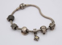 Auktion 371<br>Armband, Pandora, mit 6 Charms, 925er Silber, 34,3gr., L-16cm