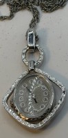 Auktion 371<br>mechan. Damen-Umh&auml;ngeuhr "Rexor" an Kette, Werk l&auml;uft