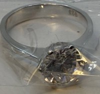 Auktion 372<br>Silberring-925- mit grossen, klaren Stein, ungetragen in Celluloid verpackt, ca. 4 gr.