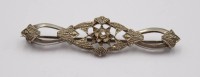 Auktion 372<br>835er Art-D&eacute;co Brosche, klarer Stein, 6,2gr., L-5,8cm