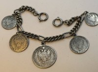 Auktion 372<br>Trachtenschmuck Charivari - Schmuckkette mit 5 k.u.k M&uuml;nzen, dat. 1859, L-22 cm