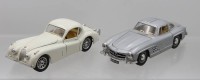 Auktion 373 / Los 12006 <br>2x Burago Modelle, Jaguar und Mercedes, 1:24