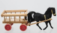Auktion 373 / Los 12040 <br>Stoffpferd mit Holzwagen aus den 20iger Jahren ,