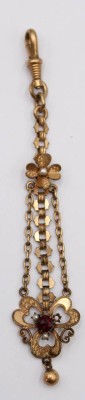 Auktion 373<br>antikes Uhren- Chatelaine aus vergoldetem Metall, mit Granat und Perlchen Besatz  [1]