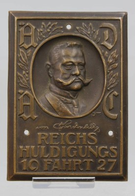 Auktion 373<br>eine ADAC-Plakette aus Bronze, die an die 