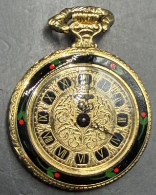 Auktion 373<br>kl. mechan. Damen Umhängeuhr 