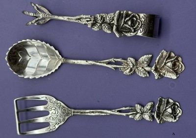 Auktion 373<br>Zuckerzange, Sahnelöffel, Gebäckheber, alle 3 Silber-835-, zus. 40 gr. L-12 cm [1]