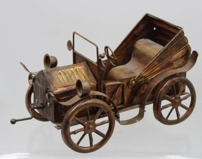 Auktion 374<br>Oldtimer-Modell, wohl Kupfer mit Spieluhr, ca. H-15cm L-30cm [1]
