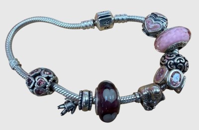 Auktion 374<br>Silber-925- Pandora Armband mit 8 Charms, zus. ca. 42,86 gr [1]