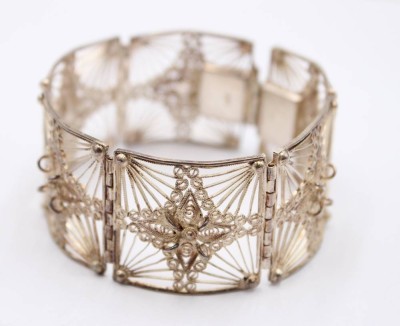 Auktion 374<br>schönes filigran gearbeitetes Armband, 835er Silber, 34,9gr., L-18,5cm B-3cm [1]