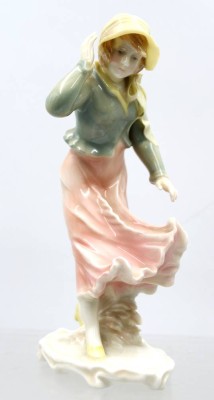 Auktion 375<br>Dame im Wind, Karl ENS, Unterglasurfarben, leider an Hutschleife bestossen, ca. H-19cm [1]