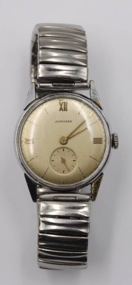 Auktion 375<br>Vintage-Herrenarmbanduhr, Junghans, Handaufzug, Zugband, Werk läuft, Tragespuren,  D-3cm [1]