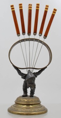 Auktion 375<br>Obstmesser in figürlichem Halter, dieser wohl WMF, 20er Jahre, ca. H-26cm [1]