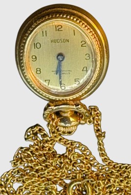 Auktion 375<br>mechan. Damenumhängeuhr an langer Double-Kette 