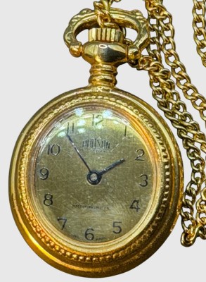 Auktion 375<br>mechan. Damenumhängeuhr an langer Double-Kette 