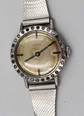 Auktion 376<br>Vintage-Damenarmbanduhr, Heno, Handaufzug, Werk läuft , Lünette mit klaren Steinen, ca. D-2,5cm, getragene Erhaltung [1]