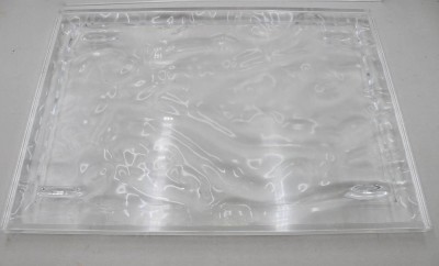 Auktion 376<br>transparentes Kartell Dune Tablett, Design Mario Bellini, Kunststoff, Gebrauchsspuren (Kratzer), ca. 38 x 55cm [1]