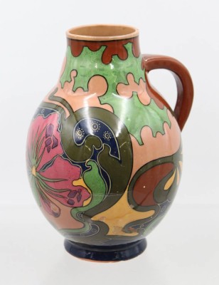 Auktion 376<br>Jugendstil-Keramikvase,  NORICA, Entw. Carl Sigmund Luber (1868-1933), leider mehrfach Abplatzer sowie Chips am Stand, ca. H-20,5cm [1]